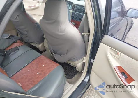 2004 Toyota Corolla Le z USA, uszkodzony, nr VIN JTDBR32E340052883